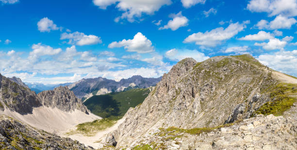 Panoramic aerial view of Innsbruck in a beautiful summer day, Austria