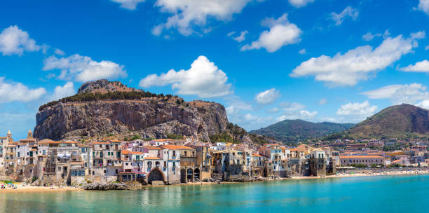 istock Sandy beach in Cefalu in Sicily 1279386422