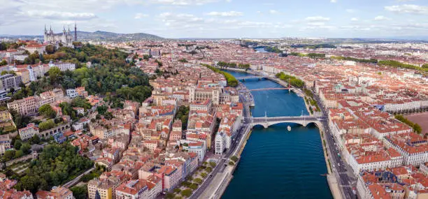 Lyon city aerial panoramic view, France, beautiful architecture of church Basilique Notre Dame de Fourviere, panorama cityscape with Saone river from above