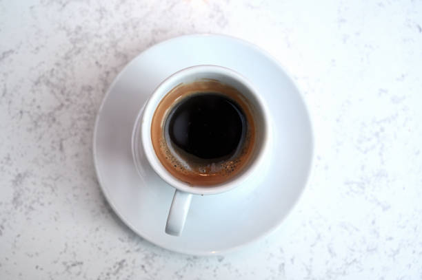 istock Cup of coffee with a white background 1279389398