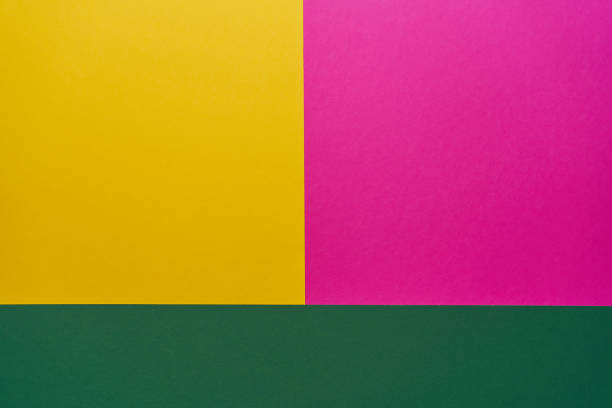 istock Yellow pink green color paper texture background 1279389464