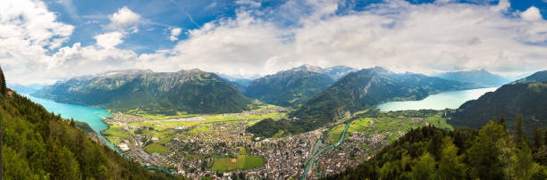 panoramablick auf interlaken - brienz mountain landscape lake stock-fotos und bilder