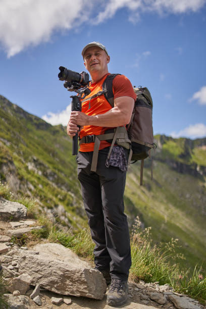 istock Filmmaker shooting with camera on gimbal 1279392683