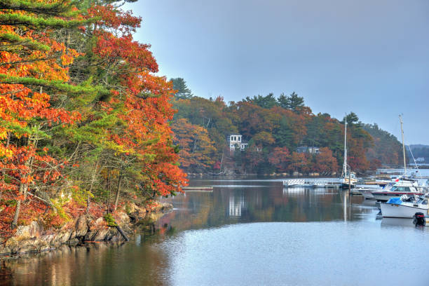 istock Beautiful Fall colors with reflection-Dock and boats-Booth Bay Harbor Maine 1279392854