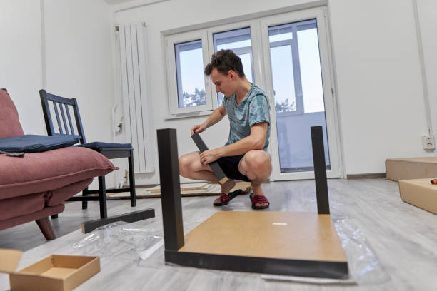istock Young couple assembling their furniture 1279393867