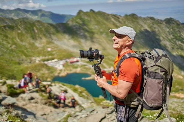 Filmmaker shooting with camera on gimbal