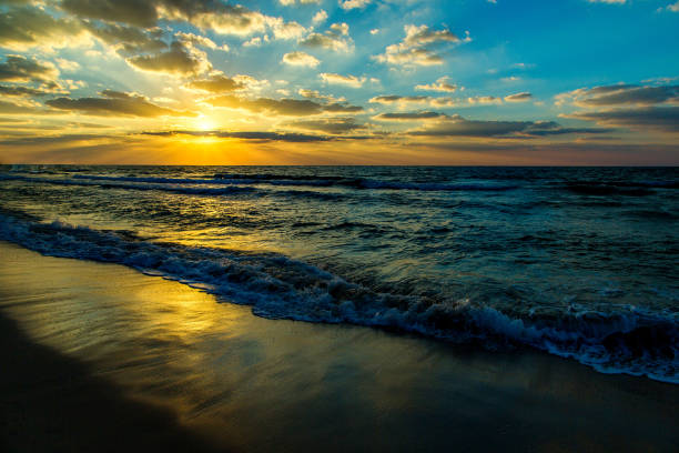 istock Beautiful sunset at the beach 1279394279