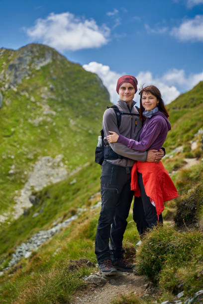 istock Hiking couple in the mountains 1279394919