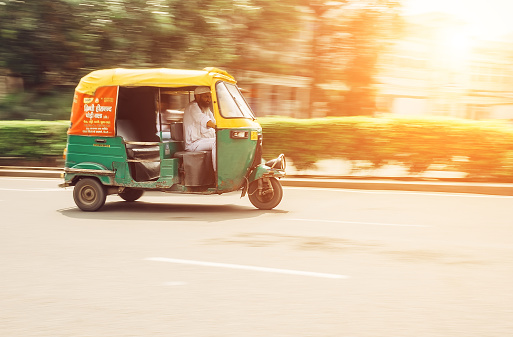 New Delhi, India - AUGUST 13: Moto-Rickshaw in motion, New Delhi, India on AUGUST 13, 2016 in New Delhi, India.