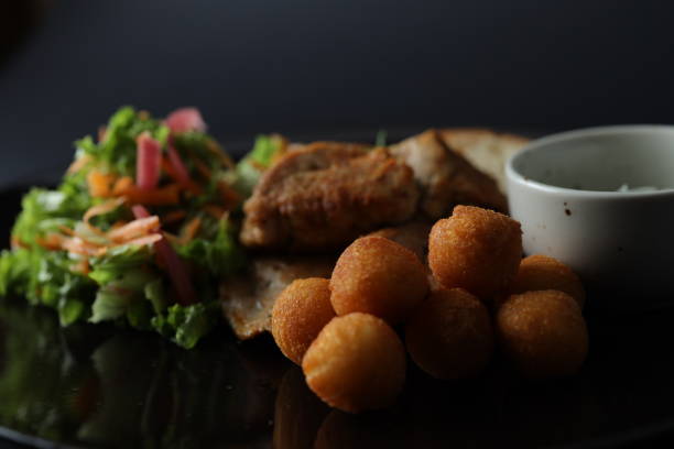 istock Dish of pork meat on black background 1279397416