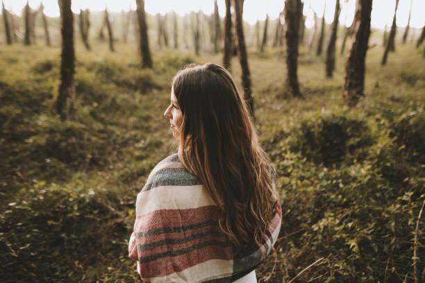 istock Young woman in a forest 1279398749