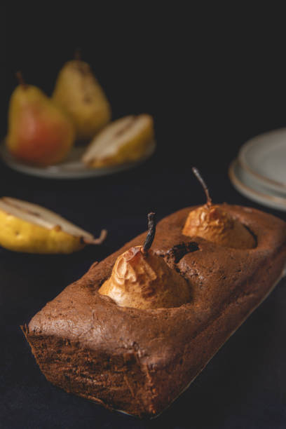 istock Homemade vegan chocolate cake with poached pears. Close-up view. 1279399586