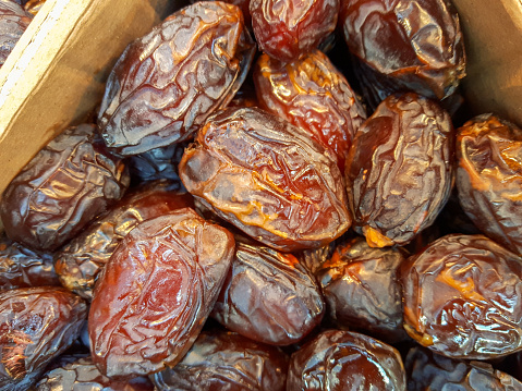 Close up of dried dates palm fruit as background