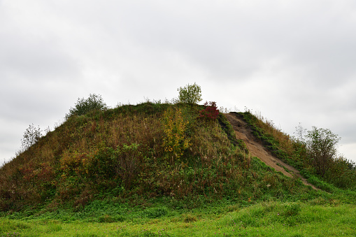 Burial mound of legendary Oleg of Novgorod on Volkhov River near Staraya Ladoga village the first capital of ancient Russia. Oleg also known as the Prophet was supreme ruler of the ancient Russia from 879 to 912