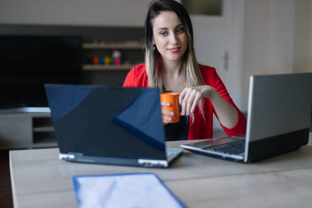 istock Young business woman working from home 1279402749
