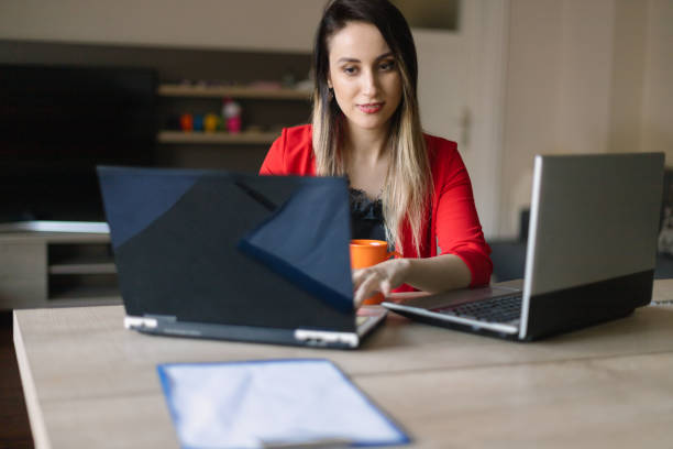 istock Young business woman working from home 1279402773