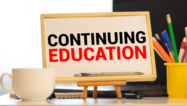 Continuing education written on classroom blackboard Continuing education written on classroom blackboard. concept post secondary education stock pictures, royalty-free photos & images