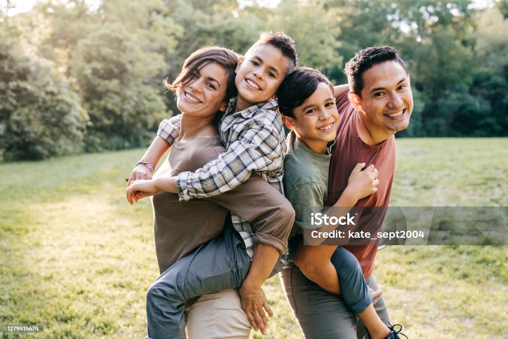 Portrait of young Mexican family Family Stock Photo