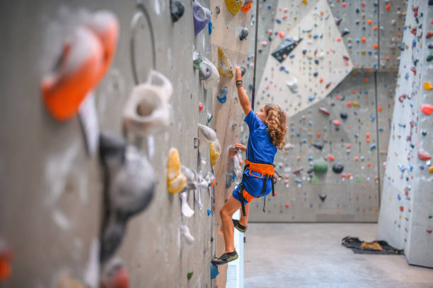 Athletic Child Indoor Rock Climbing