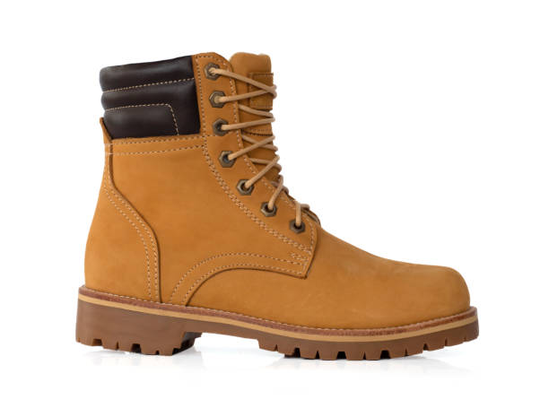 istock Men fashion leather yellow boot isolated on white background. side view 1279417017