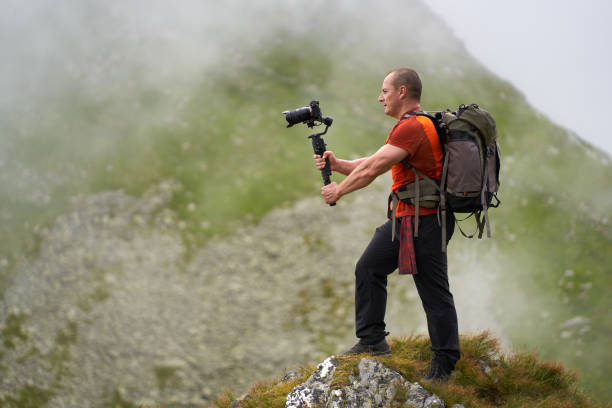 istock Filmmaker shooting with camera on gimbal 1279418727