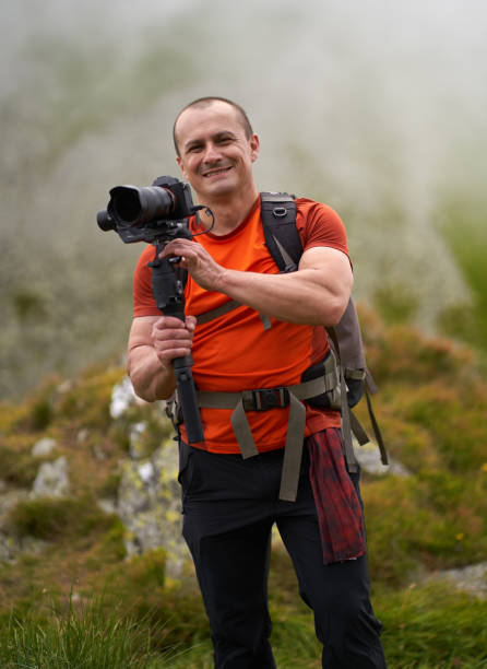 istock Filmmaker shooting with camera on gimbal 1279418737