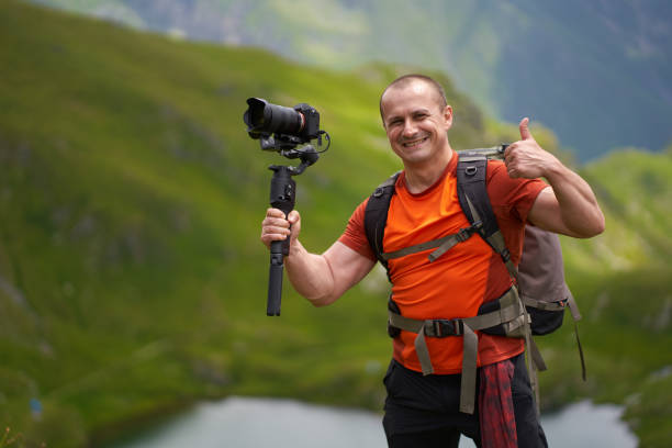 istock Filmmaker shooting with camera on gimbal 1279418739