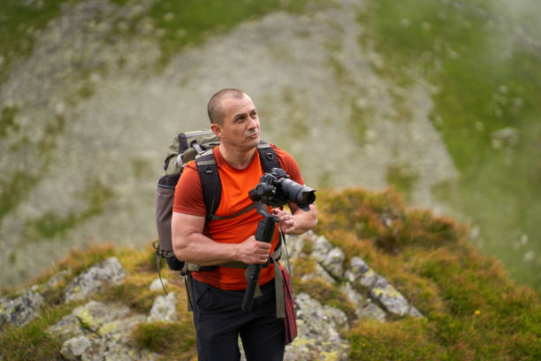 istock Filmmaker shooting with camera on gimbal 1279418745
