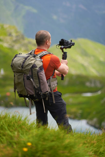 Filmmaker shooting with camera on gimbal