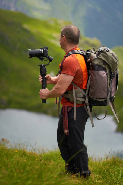 istock Filmmaker shooting with camera on gimbal 1279418747