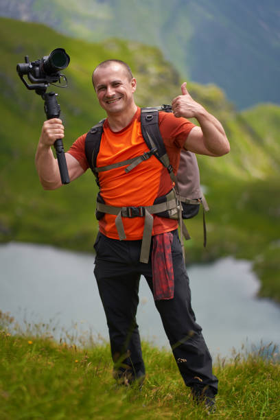 istock Filmmaker shooting with camera on gimbal 1279418750