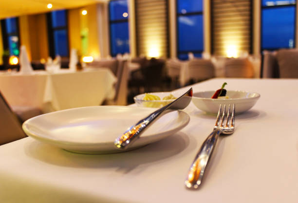 istock The fork, knife and dish on the table in restaurant 1279423169
