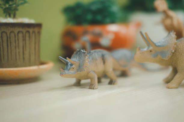 istock Selective focus of a crowd gathered of toy plastic dinosaurs 1279423892