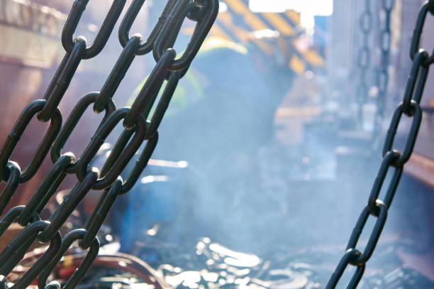 welder doing welding on deck of ship lashing cargo - naval ship imagens e fotografias de stock