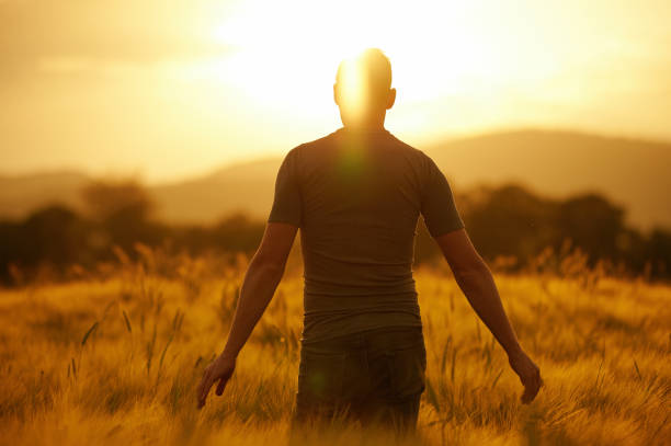 istock Man enjoying the view from the wheat field 1279425383