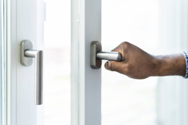 istock African American Man Opening Office Window 1279444415