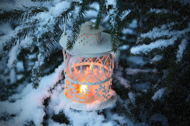 istock Christmas lantern with burning candle 1279445571