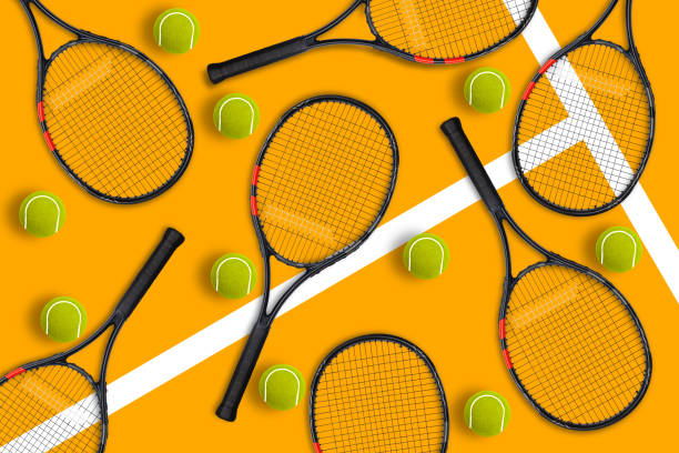 istock Tennis racket balls on yellow background 1279447557