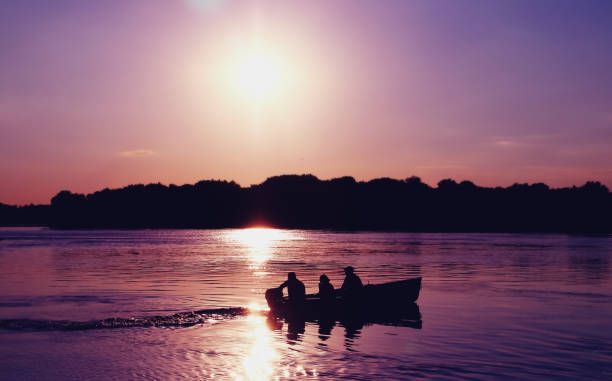 istock The silhouette of a boat navigating the Danube river. 1279460107