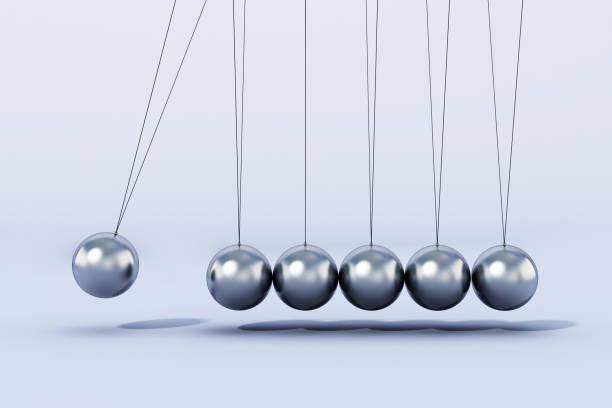 istock Group of colliding metal spheres creating perpetual motion 1279467697