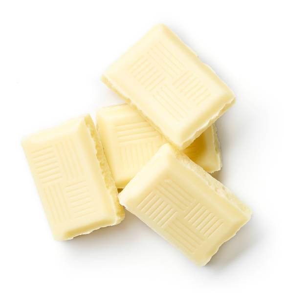 istock Heap of white chocolate isolated on white, from above 1279468567