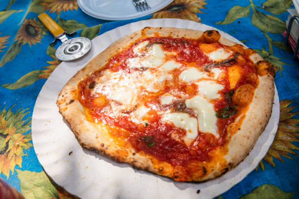 istock Delicious Italian Pizza on a table 1279468675