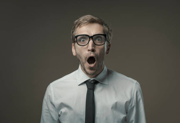 istock Young businessman feeling shocked and scared 1279471705