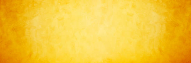 istock yellow and orange soft gradient cement and concrete backdrop background 1279473051