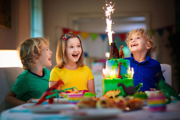 istock Kids birthday party. Dinosaur theme cake. 1279474168
