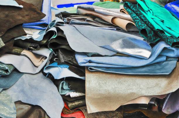 istock Detailed close up view on samples of cloth and fabrics in different colors found at a fabrics market 1279474577
