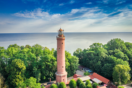 Lighthouse in summer by Baltic Sea, aerial view, Poland