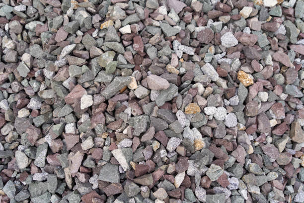 istock White granite gravel stones flooring pattern surface texture. Close-up of exterior material for design decoration background 1279481147
