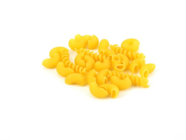istock Raw Italian pasta heap isolated on a white background. Cooking concept. 1279482321