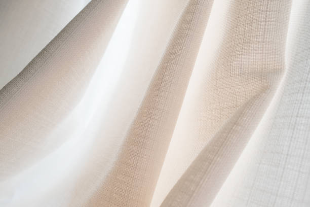 istock light fabric in a fold, background for photo, curtains, textiles, interior item 1279484371